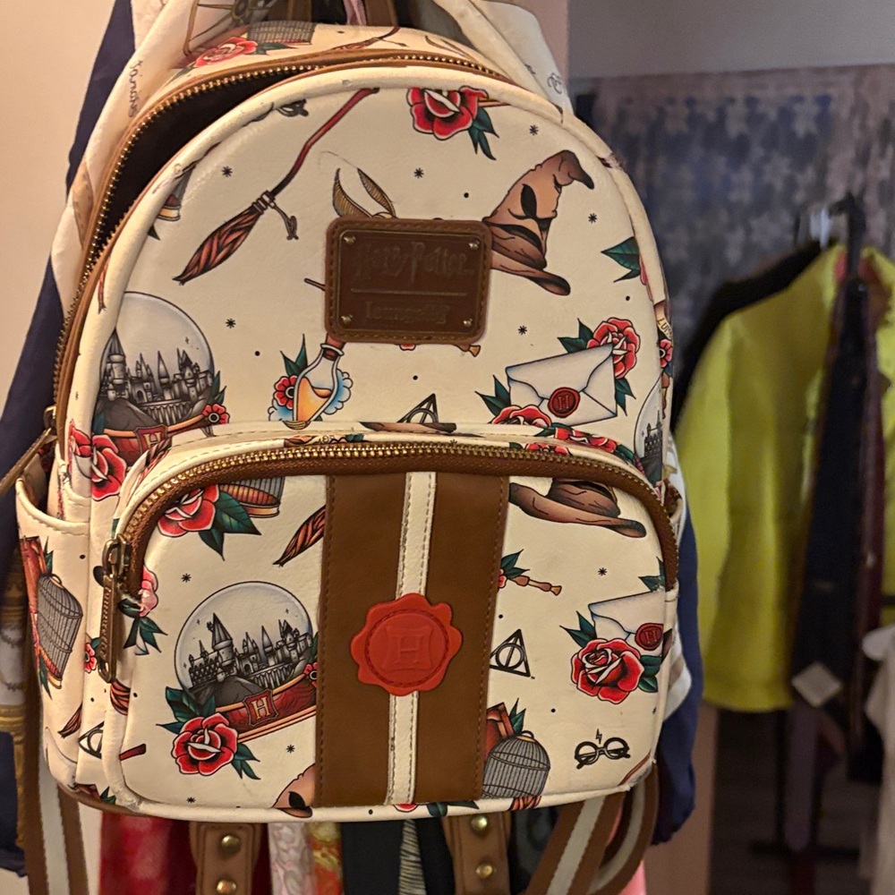 Loungefly Harry Potter Cream Backpack with Red and Brown Design